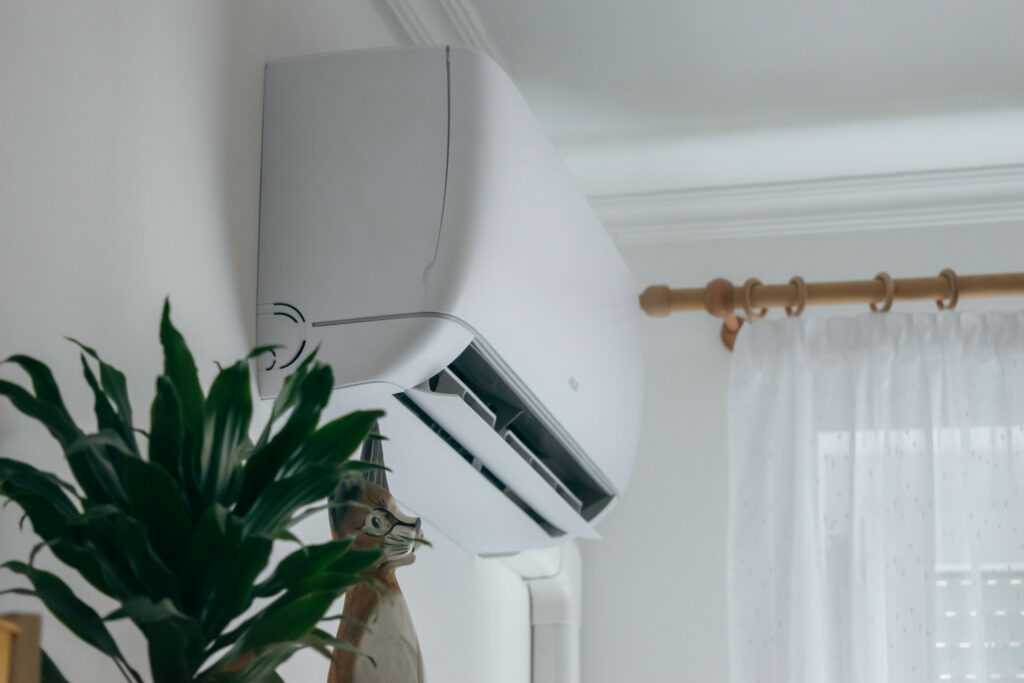 Mini-split air conditioner on a white wall closeup